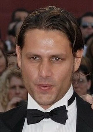 Adam Bousdoukos headshot