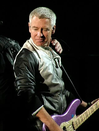 Adam Clayton headshot