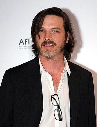 Aden Young headshot
