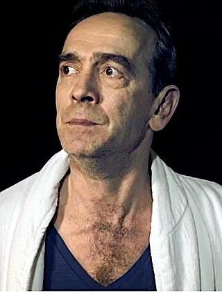 Adrian Schiller headshot