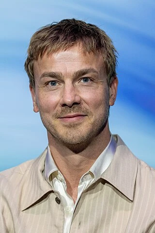 Albrecht Schuch headshot
