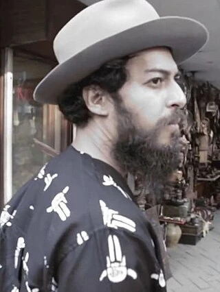 Alex Abbad headshot