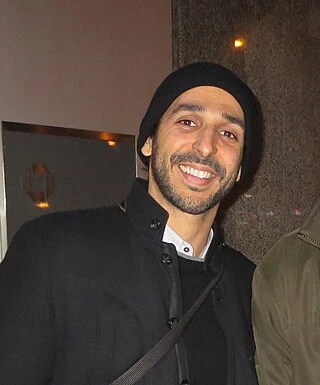Amir Arison headshot