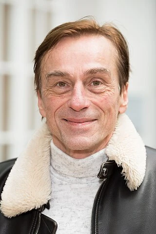 André Hennicke headshot