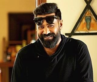 Biju Menon headshot