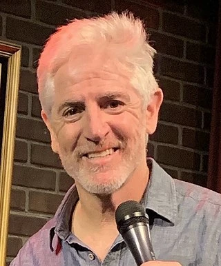 Carlos Alazraqui headshot