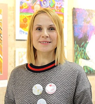 Dina Korzun headshot