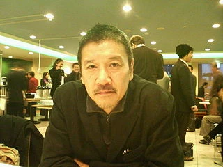 Eiji Okuda headshot