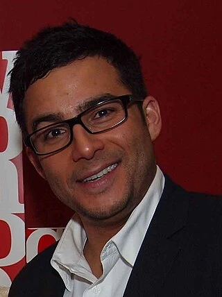 Ennis Esmer headshot
