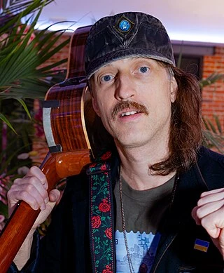 Eugene Hütz headshot