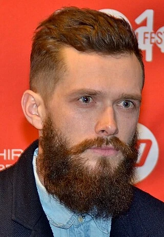 Grigoriy Dobrygin headshot