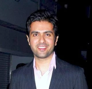 Harman Baweja headshot