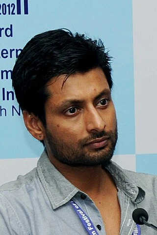 Indraneil Sengupta headshot