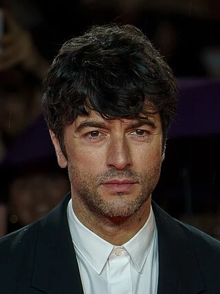 Javier Rey headshot