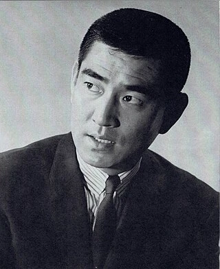 Ken Takakura headshot