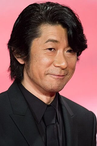 Masatoshi Nagase headshot