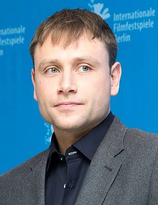 Max Riemelt headshot