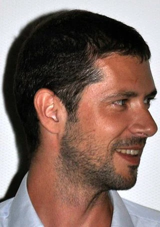 Melvil Poupaud headshot