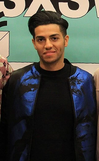 Mena Massoud headshot