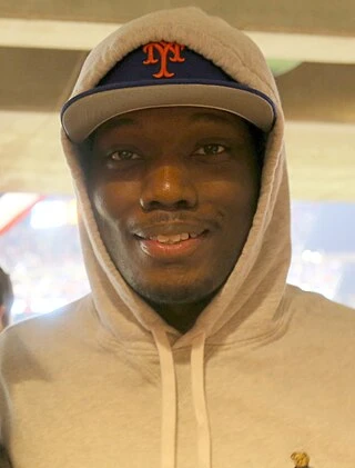 Michael Che headshot