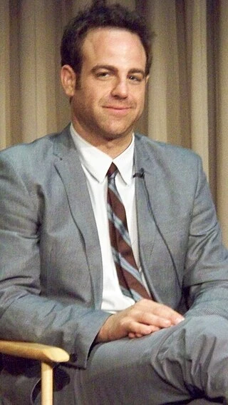 Paul Adelstein headshot