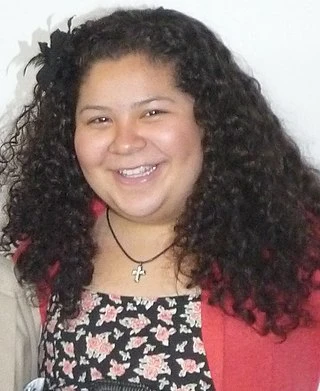 Raini Rodriguez headshot