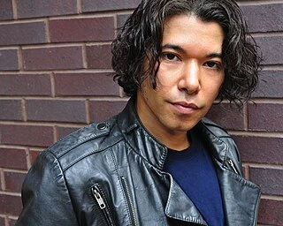 Renoly Santiago headshot