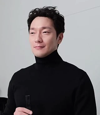 Son Suk-ku headshot