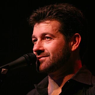 Tab Benoit headshot