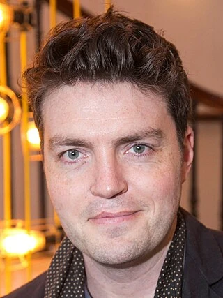 Tom Burke headshot
