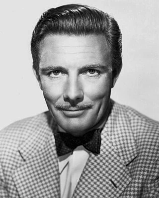 Tom Helmore headshot