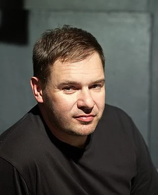 Tomasz Karolak headshot