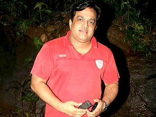 Vivek Shauq headshot