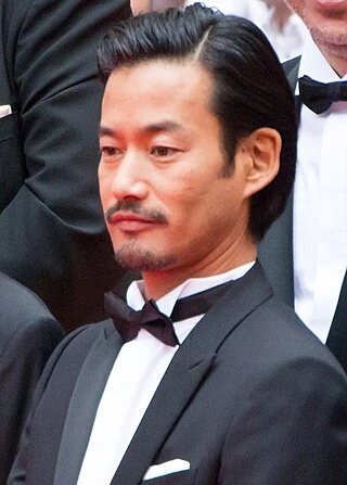 Yutaka Takenouchi headshot